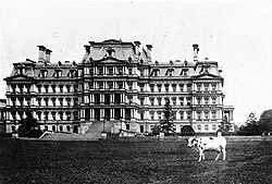 Pauline Wayne in front of the Navy Building, known today as the Eisenhower Executive Office Building