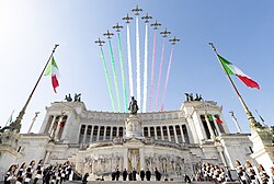 The Frecce Tricolori, with the smoke trail representing the national colours of Italy, above the Victor Emmanuel II Monument in Rome during the celebrations of the Festa della Repubblica