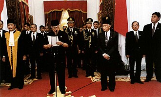 Fall of Suharto: President Suharto resigns, 21 May 1998.