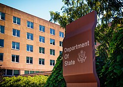 A hatched rendering of the coat of arms being used at the Department of State headquarters at Harry S Truman Building.