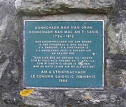 The Gaelic inscription plaque on the memorial to the poet Duncan Ban MacIntyre, born in 1724 at Druim Liaghart and who died in 1812.