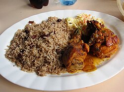 Rice and beans (with coconut milk), stewed chicken and potato salad; an inter-ethnic staple meal