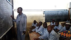 Inmate teaching other inmates in Kenya