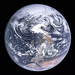A photo of Earth from Apollo 17 (Blue Marble) with the South Pole at the top and the continent of Africa