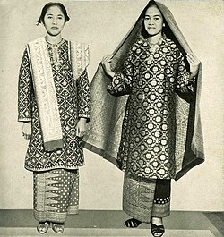 Ladies from Palembang clad in their traditional attire, known as Baju Kurung made from Songket. The dress is commonly associated with women of Malay extraction.