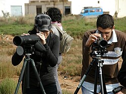 Moroccan students watching birds at Nador's lagoon as a part of environmental education activities organized by the Spanish Ornithological Society