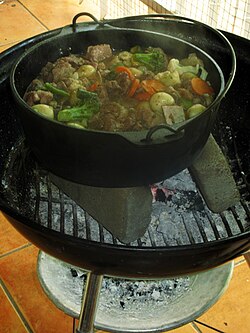 Potjiekos is a traditional Afrikaner stew made with meat and vegetables and cooked over coals in cast-iron pots.
