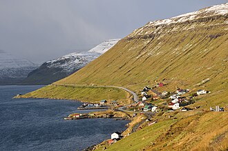 The village of Skipanes on Eysturoy, with murkier weather in the distance