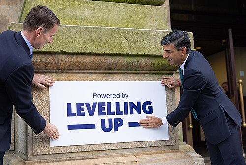 Chancellor of the Exchequer Jeremy Hunt (left) and Prime Minister Rishi Sunak (right) in January 2023, promoting the government's "Levelling up policies", on a visit to Accrington Market