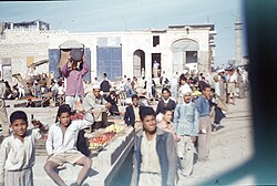 Palestinians in an outdoor market in the Gaza Strip in 1956