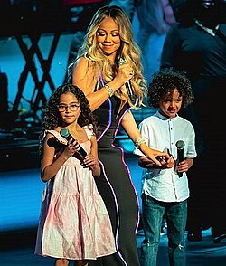 Carey with her twins in 2019