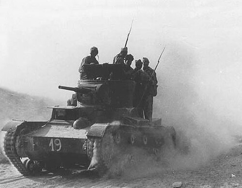 International Brigadiers volunteered on the side of the Republic. The photo shows members of the XI International Brigade on a T-26 tank during the Battle of Belchite (August–September 1937).