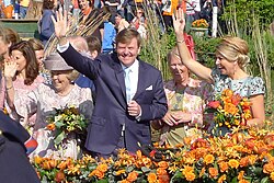 King Willem-Alexander, Queen Maxima and Princess Beatrix during the celebration of Koningsdag 2014 in De Rijp