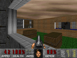 Freedoom, a clone of the first-person shooter Doom. Common elements include a heads-up display along the bottom that includes the player's remaining health and ammunition.