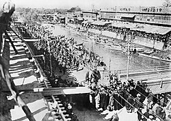 Turkish prisoners passing along the bank of Ashar Creek, nearing Whiteley's Bridge, Basra 1917.