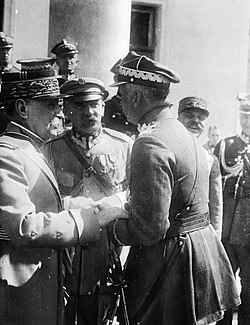 Foch and General Kazimierz Sosnkowski at Belweder Palace in Warsaw (1923). Marshal of Poland Józef Piłsudski is in the center.
