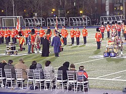 Prince Charles, Prince of Wales, presents new colours to the Royal Regiment of Canada and Toronto Scottish Regiment at Varsity Stadium in Toronto, 5 November 2009
