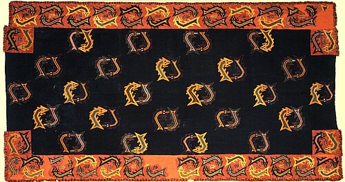 Nazca mantle from Paracas Necropolis, 0-100 CE This is a "double fish" (probably sharks) design. Brooklyn Museum collections.
