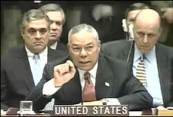 US Secretary of State Colin Powell holds a model vial of anthrax while presenting to the Security Council in February 2003