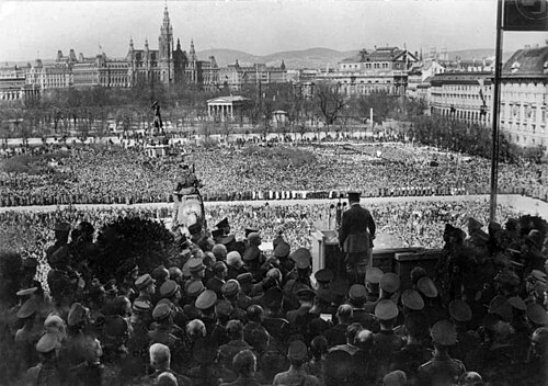Adolf Hitler announcing the Anschluß in violation of Art. 80 on the Heldenplatz, Vienna, 15 March 1938