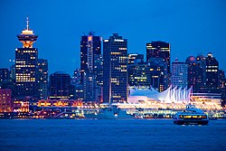 A SeaBus crosses Burrard Inlet between Vancouver and the neighbouring city of North Vancouver.