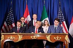 President Enrique Peña Nieto, President Donald Trump, and Prime Minister Justin Trudeau sign the USMCA agreement during the G20 summit in Buenos Aires, Argentina, on 30 November 2018.