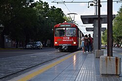 Passengers boarding a Siemens–Duewag U2 in Mendoza