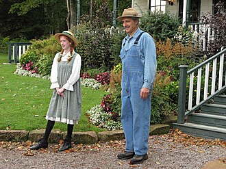 Actors at the Anne of Green Gables Museum on Prince Edward Island, Canada. Since its first publication in 1908, the story of the orphaned Anne, and how the Cuthberts took her in, has been widely popular in the English-speaking world and, later, Japan.