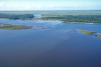 The MRGO and an outlet into Lake Borgne, approximately 50 miles (80 km) up the canal from its mouth and 15 miles (24 km) east of New Orleans (view towards the southwest)