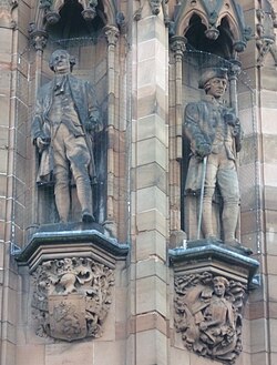 Statues of David Hume and Adam Smith by David Watson Stevenson on the Scottish National Portrait Gallery in Edinburgh