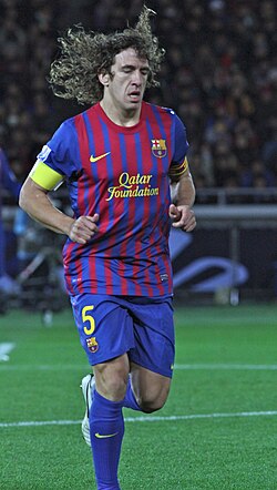 Carles Puyol captained Barcelona to the first Spanish treble.[7]