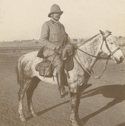 Major Douglas Haig seen mounted on a grey horse near Pretoria, in the Transvaal Republic on Friday, 8 June 1900.