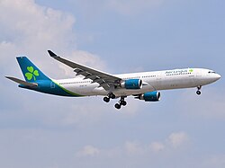 An Aer Lingus Airbus A330 with a shamrock on its tail fin