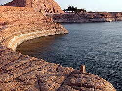 A rounded area in the lake, made when the mountain around the Great Temple was cut away.