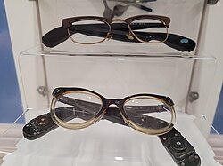 1940s combined hearing aid glasses, on display at Thackray Museum of Medicine.[2]
