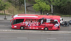 Atlético de Madrid's bus, decorated with red and white colours