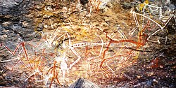 Aboriginal rock painting of Mimi spirits in the Anbangbang gallery at Nourlangie Rock in Kakadu National Park.