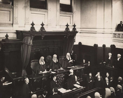 The first Chief Justice of Australia, Sir Samuel Griffith, is administered the judicial oath at the first sitting of the High Court, in the Banco Court of the Supreme Court of Victoria, 6 October 1903.