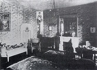 Le Salon Bourgeois, designed by André Mare for La Maison Cubiste, in the decorative arts section of the Salon d'Automne, 1912, Paris. Metzinger's Femme à l'Éventail on the left wall