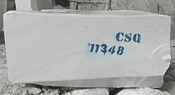 July 2011: Block of Yule Marble in the quarry, 1,300 feet (400 m) above and 3.9 miles (6.3 km) from the town of Marble, Colorado.
