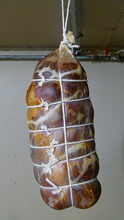 Capocollo (a.k.a. coppa, gabagool) traditionally uses beef cap bung, from the far side of the caecum; it is trussed and hung to cure.
