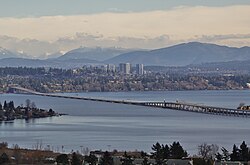 The Evergreen Point Floating Bridge on Lake Washington with Downtown Bellevue in the background