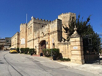 Castello Dei Baroni, a 20th-century country residence in Wardija, Malta, designed with castle-like features.