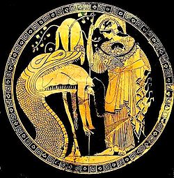 Athena's aegis, with Gorgon, here resembles the skin of the serpent who guards the golden fleece (regurgitating Jason); cup by Douris, early fifth century BC (Vatican Museums)