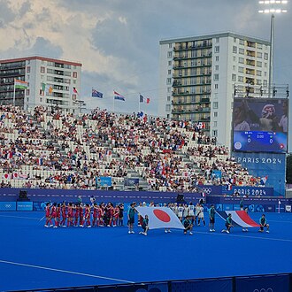 Host nation France preparing for their match against Japan in the 2024 Summer Olympics women's field hockey tournament