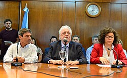 Minister of Health Ginés González García (center) announcing the first case of COVID-19 in the country, 3 March 2020