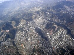 Cidade Tiradentes is a heavily populated area in the outskirts of São Paulo consisting mainly of public housing projects. On average, its inhabitants spend 2 hours and 45 minutes a day commuting between home and work.[1]