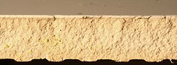 Cross section of an earthenware tile