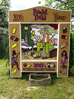 Well dressing in Etwall, Derbyshire, depicting various characters from Dahl's stories, marking the centenary of his birth