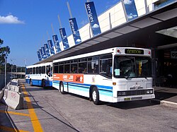 Pressed Metal Corporation South Australia bodied MAN 11.640 still with Shorelink branding, at Macquarie Centre in March 2005